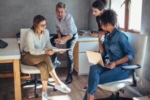 Group of colleagues discussing an idea. 