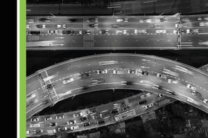 Aerial view of a curved intersection on a highway.